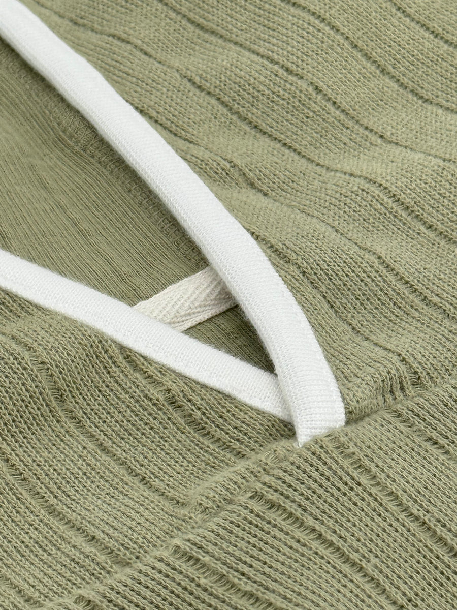 Close-up of the Captain's Pullover Hoodie rib knit and cream lined hood rim